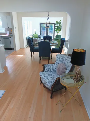 a living room with furniture and a window