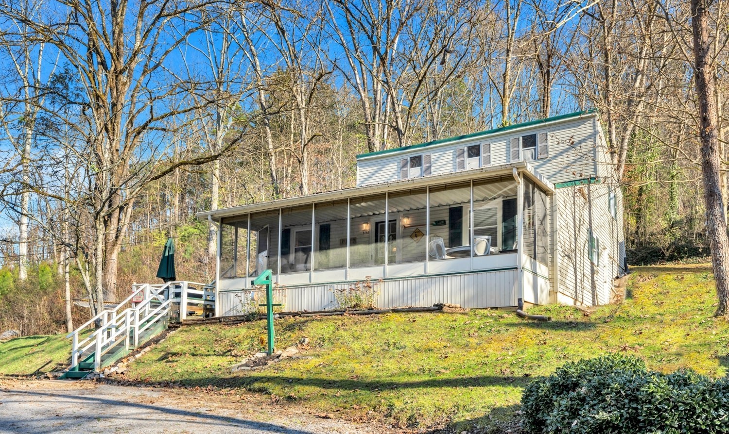 3745 Holmes Creek Road Smithville, TN 37166 - Photo 1 of 23 a view of a house with a yard