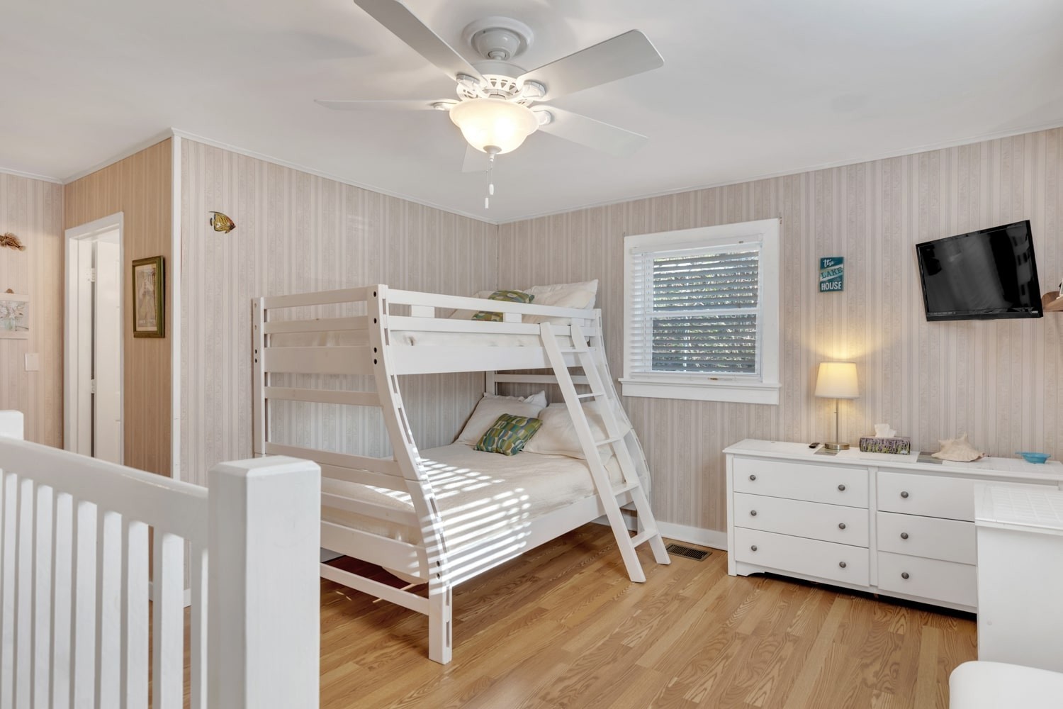 3745 Holmes Creek Road Smithville, TN 37166 - Photo 12 of 23 a bedroom with a bed and a flat tv screen on the dresser