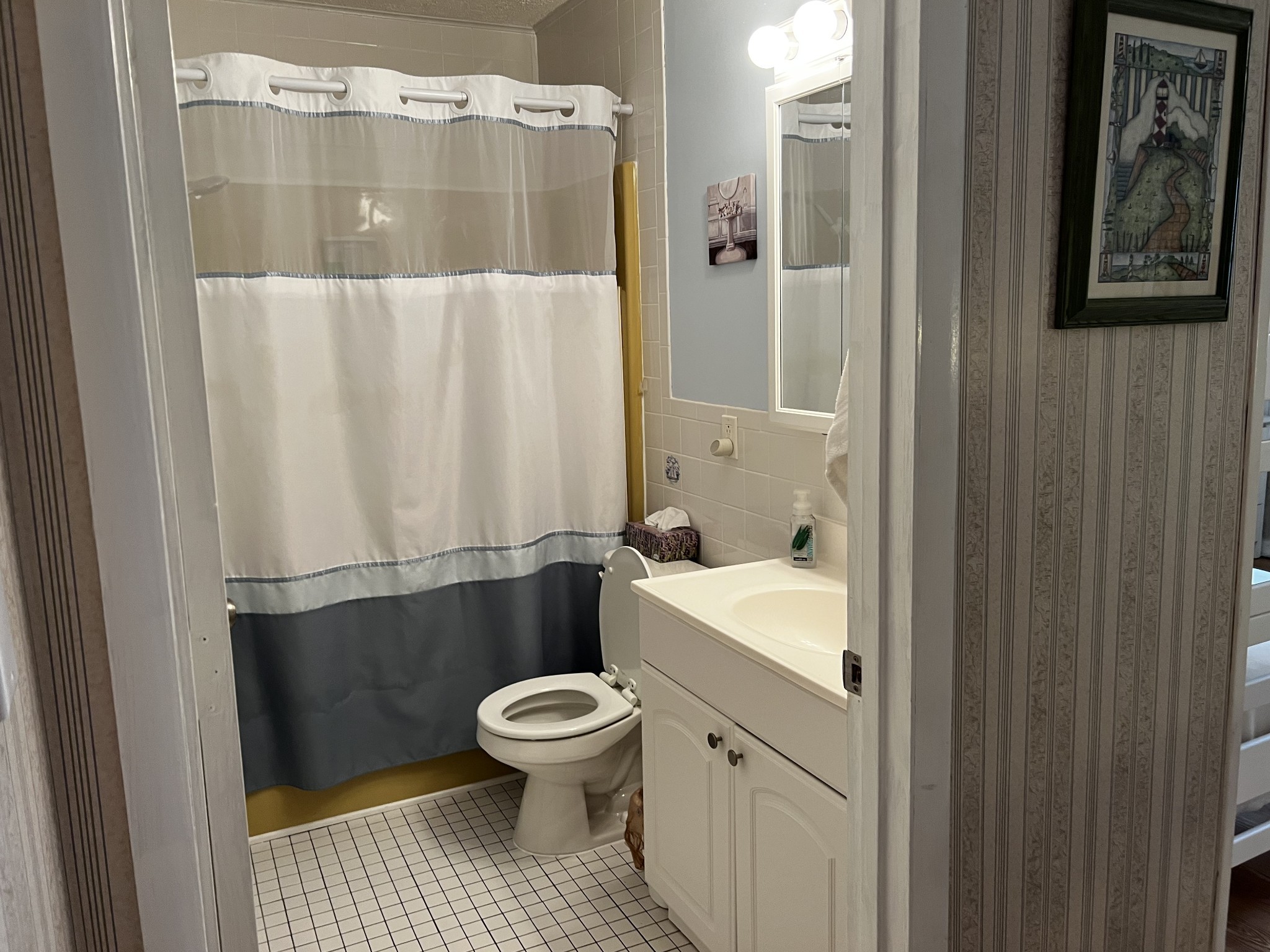 3745 Holmes Creek Road Smithville, TN 37166 - Photo 14 of 23 a bathroom with a sink toilet and shower
