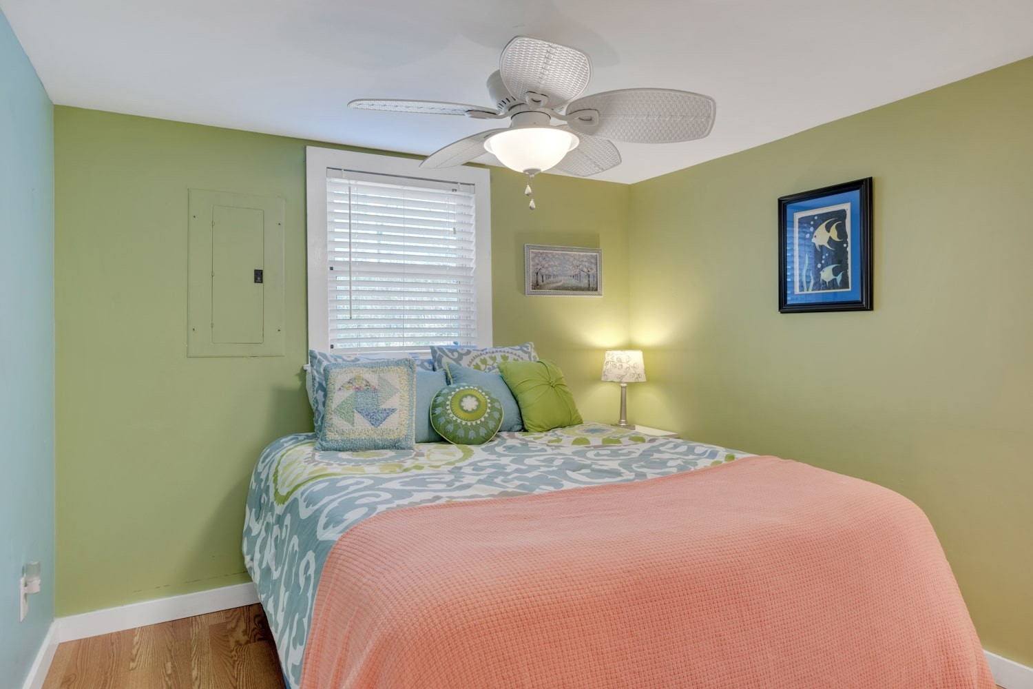 3745 Holmes Creek Road Smithville, TN 37166 - Photo 16 of 23 a bedroom with a bed and a chandelier