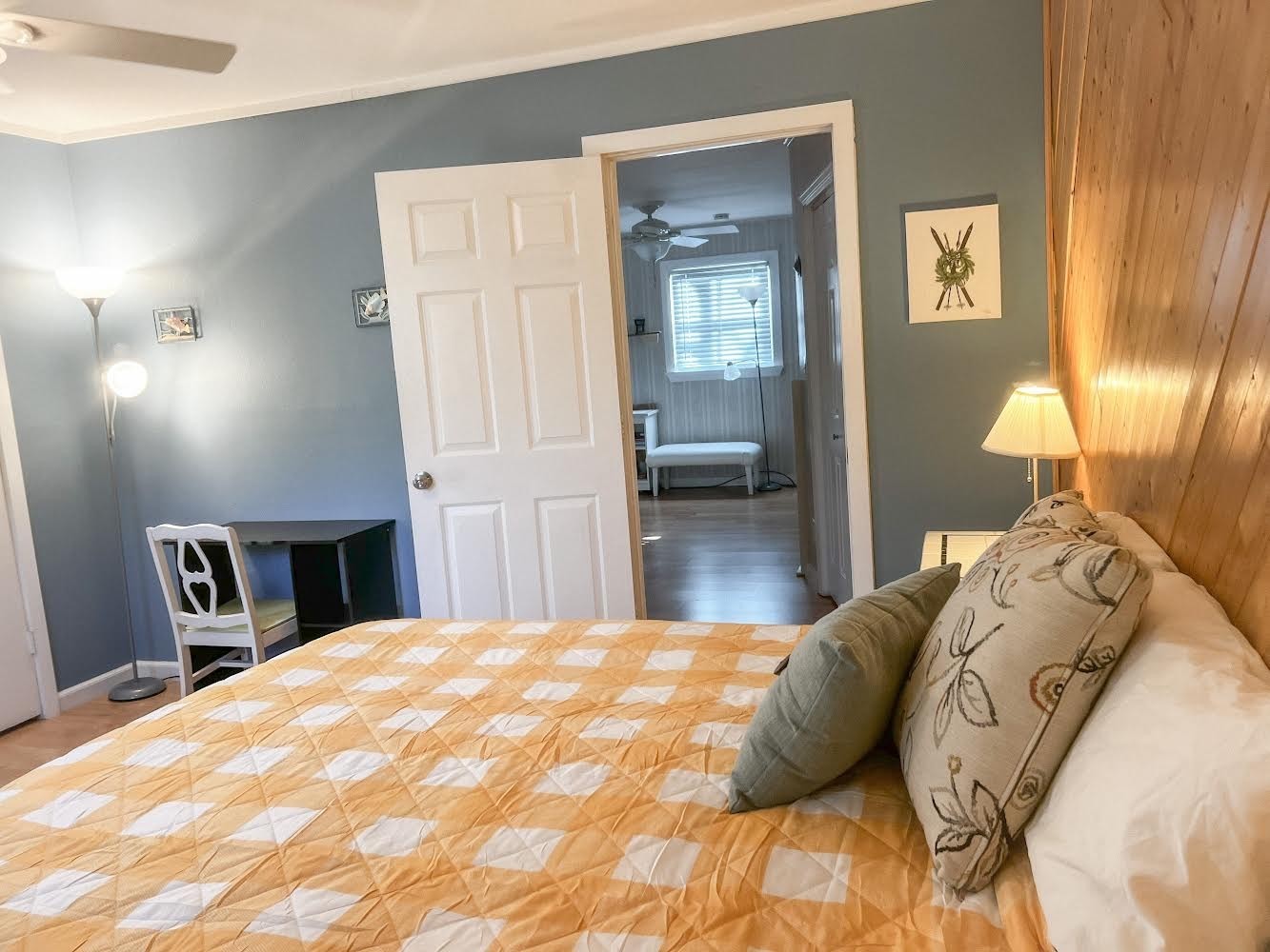 3745 Holmes Creek Road Smithville, TN 37166 - Photo 18 of 23 a bedroom with a bed and a lamp