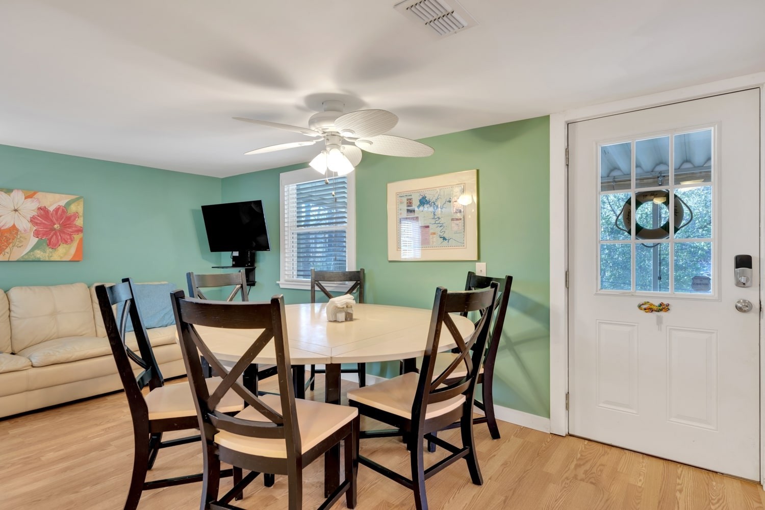 3745 Holmes Creek Road Smithville, TN 37166 - Photo 5 of 23 a view of a dining room with furniture and a flat screen tv