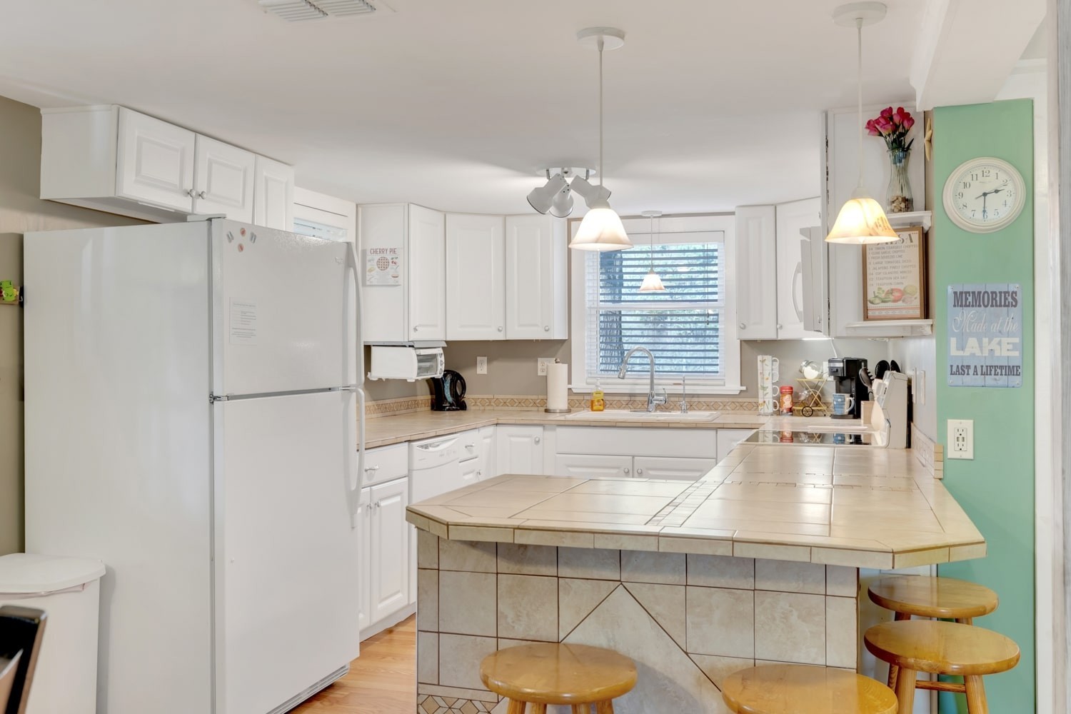 3745 Holmes Creek Road Smithville, TN 37166 - Photo 9 of 23 a kitchen with kitchen island a sink appliances and a counter top space