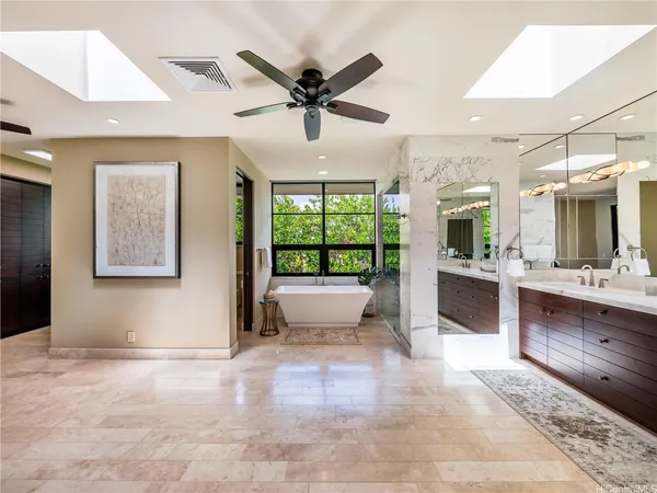 a view of a kitchen with a sink and a window