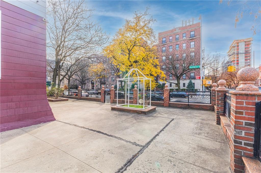 1027 Bushwick Avenue Brooklyn, NY 11221 - Photo 7 of 10 a view of building with yard