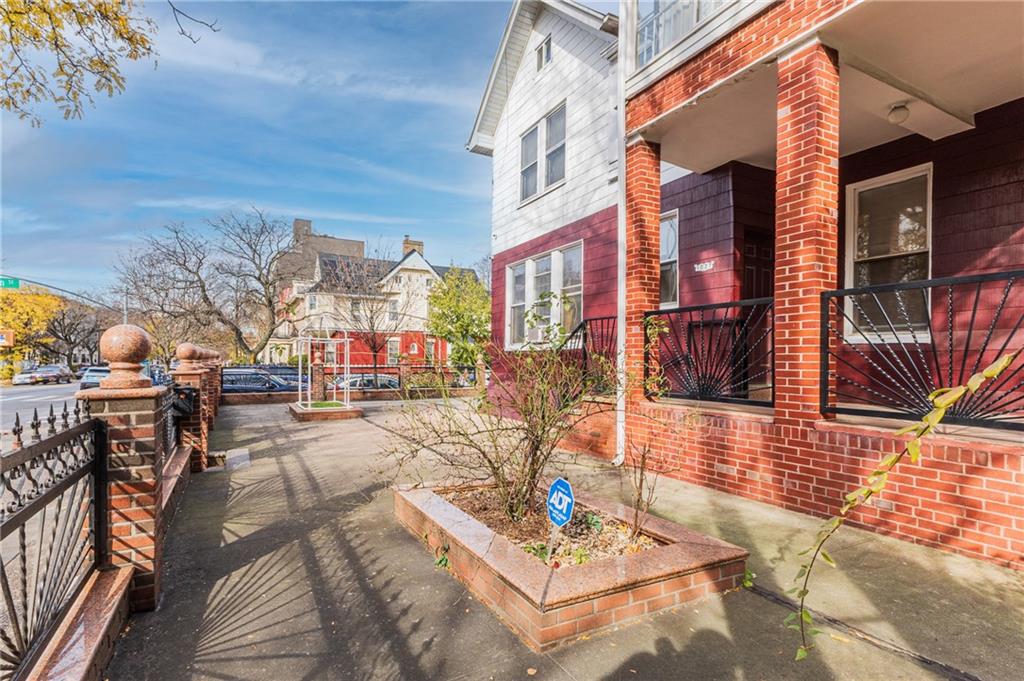 1027 Bushwick Avenue Brooklyn, NY 11221 - Photo 8 of 10 a view of a building with many windows