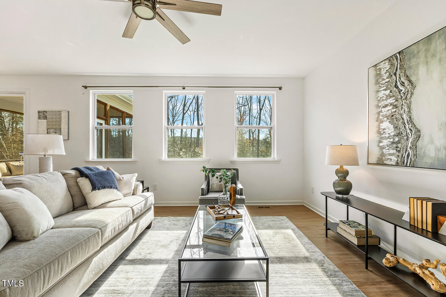 143 Rossell Park Circle Garner, NC 27529 - Photo 15 of 42 a living room with furniture and a rug
