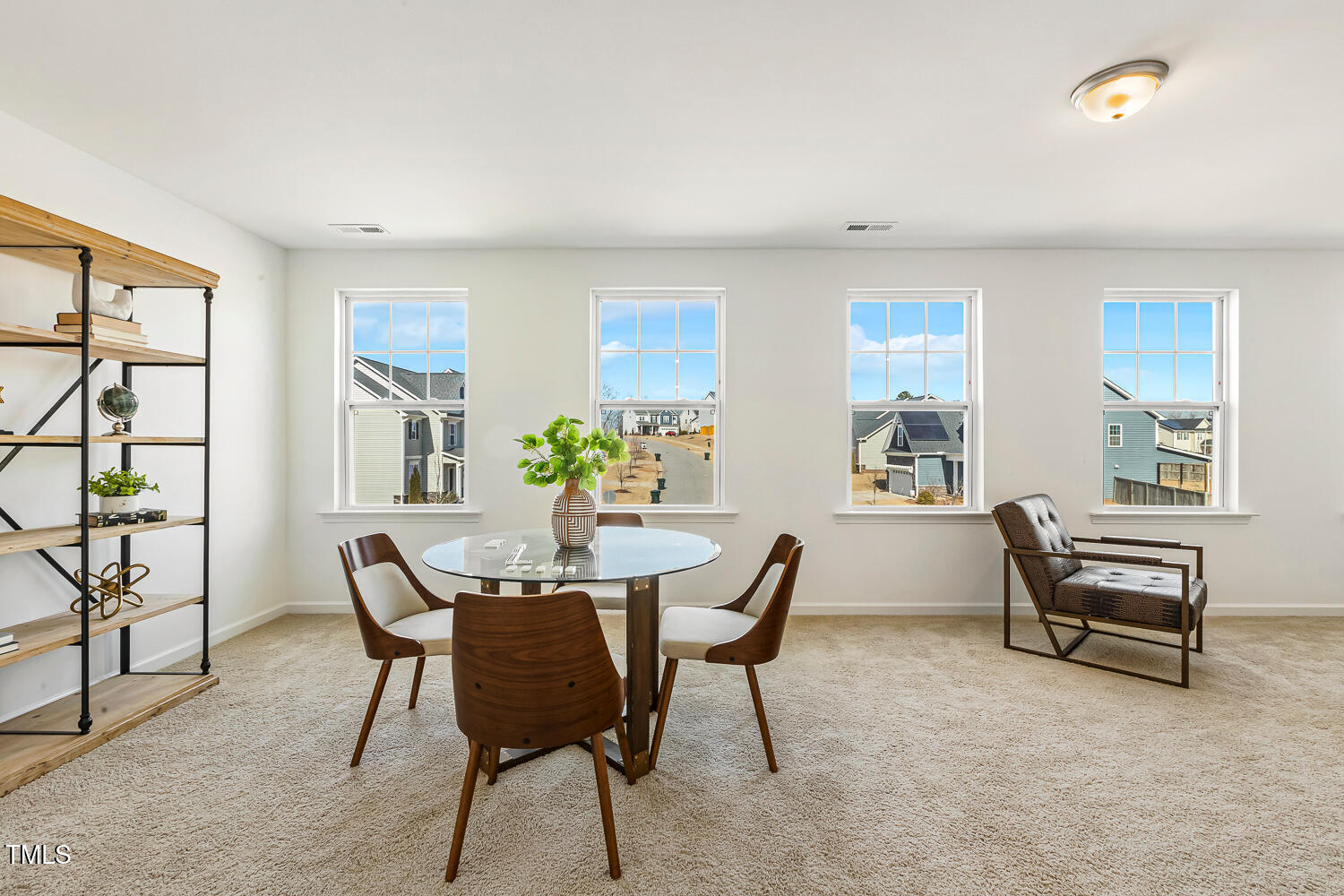 143 Rossell Park Circle Garner, NC 27529 - Photo 26 of 42 a view of a livingroom with furniture and windows