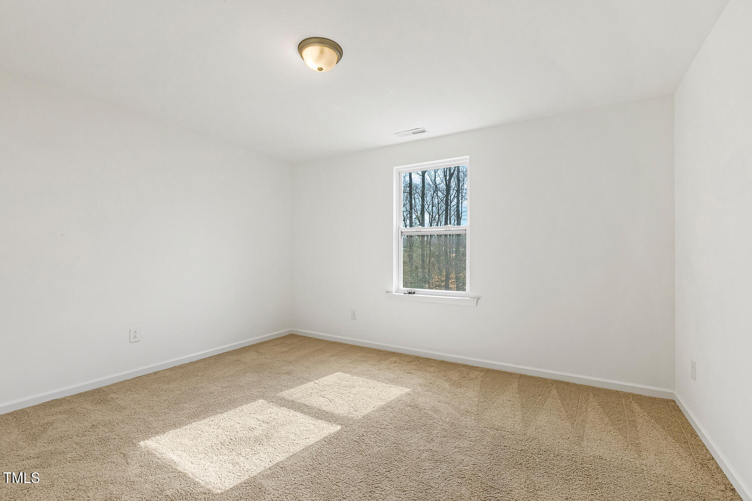 143 Rossell Park Circle Garner, NC 27529 - Photo 34 of 42 an empty room with windows