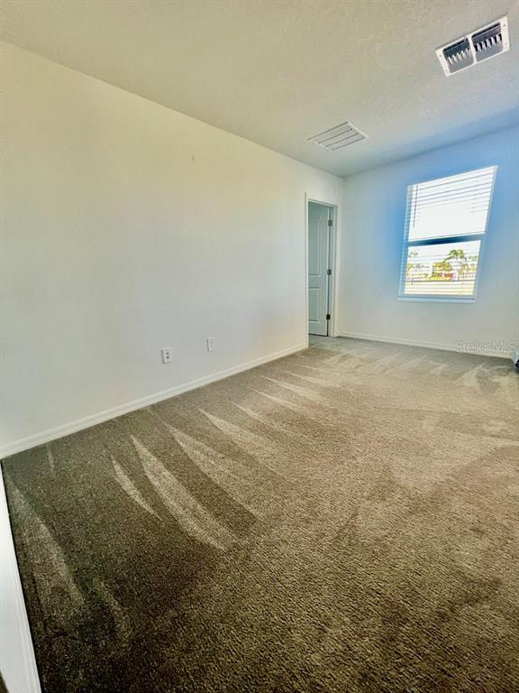 9023 Bay Leaf Drive Parrish, FL 34219 - Photo 15 of 31 a view of an empty room