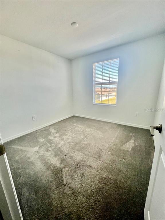 9023 Bay Leaf Drive Parrish, FL 34219 - Photo 18 of 31 an empty room with a window