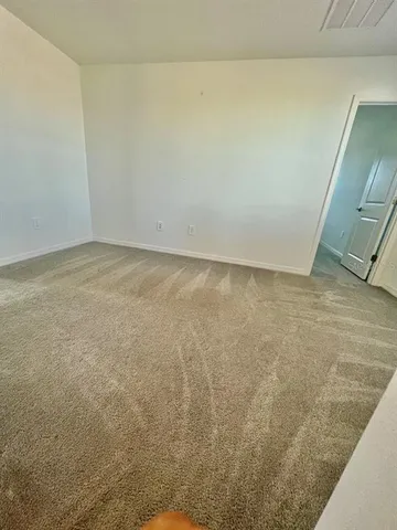 a view of a room with an empty space