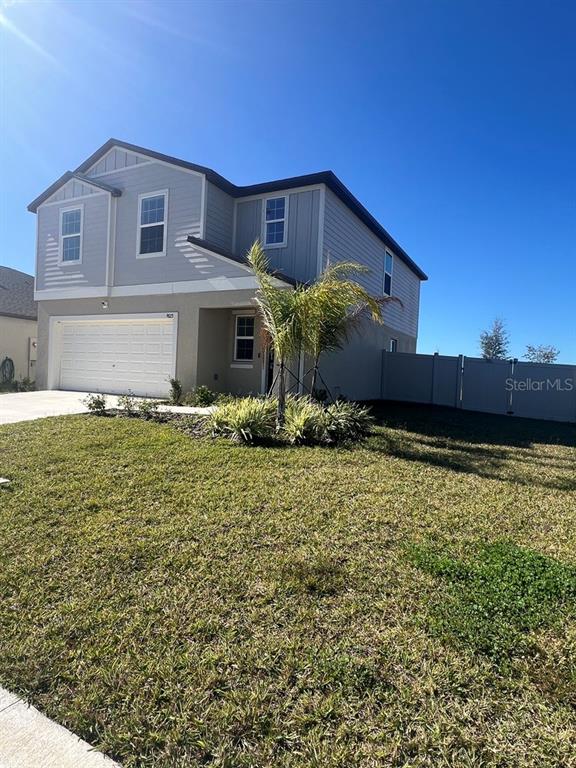 9023 Bay Leaf Drive Parrish, FL 34219 - Photo 2 of 31 a view of a house with a yard