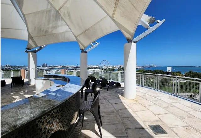a view of an empty room with glass door