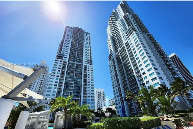 a view of a city with tall buildings