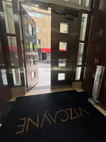 a view of a city with tall buildings