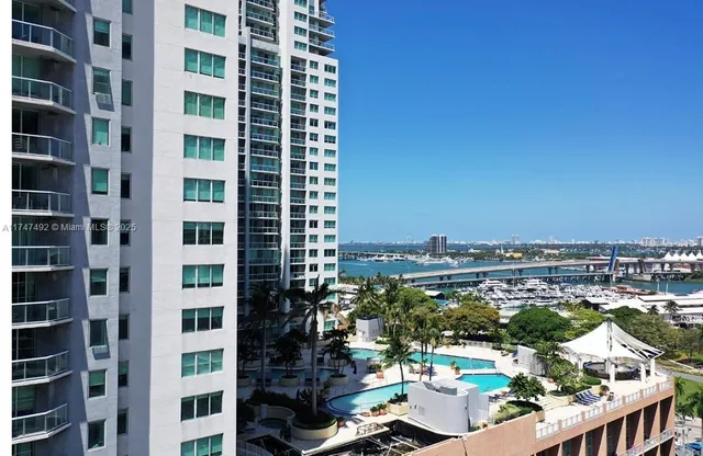 a view of a city with tall buildings