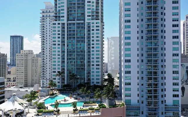 a view of a livingroom with furniture and window