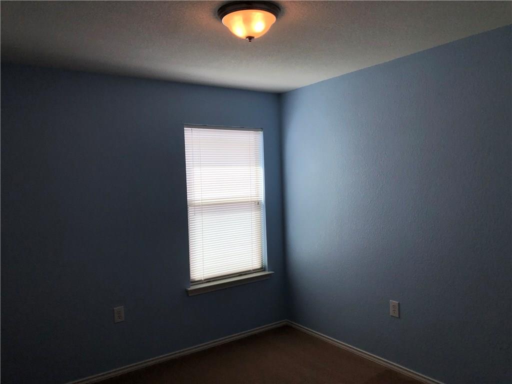 6912 Walkup Lane Austin, TX 78747 - Photo 8 of 14 a view of an empty room and window