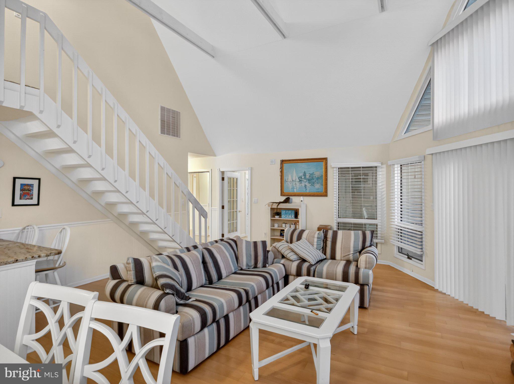 103 Channel Buoy Road Ocean City, MD 21842 - Photo 11 of 29 Bright and airy living space awaits.