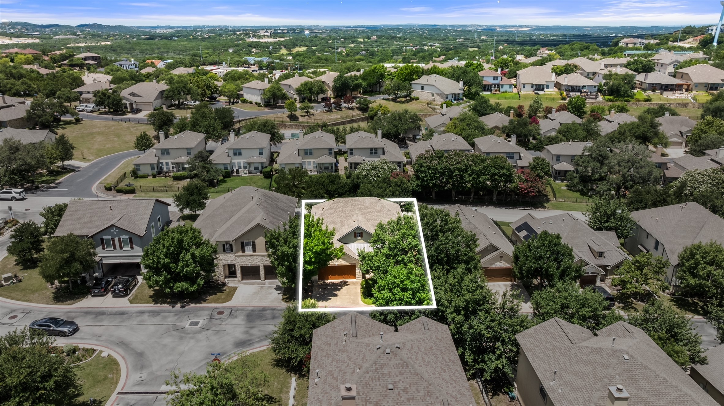 24 Stone Terrace Drive Austin, TX 78734 - Photo 28 of 32 an aerial view of residential houses with outdoor space and trees