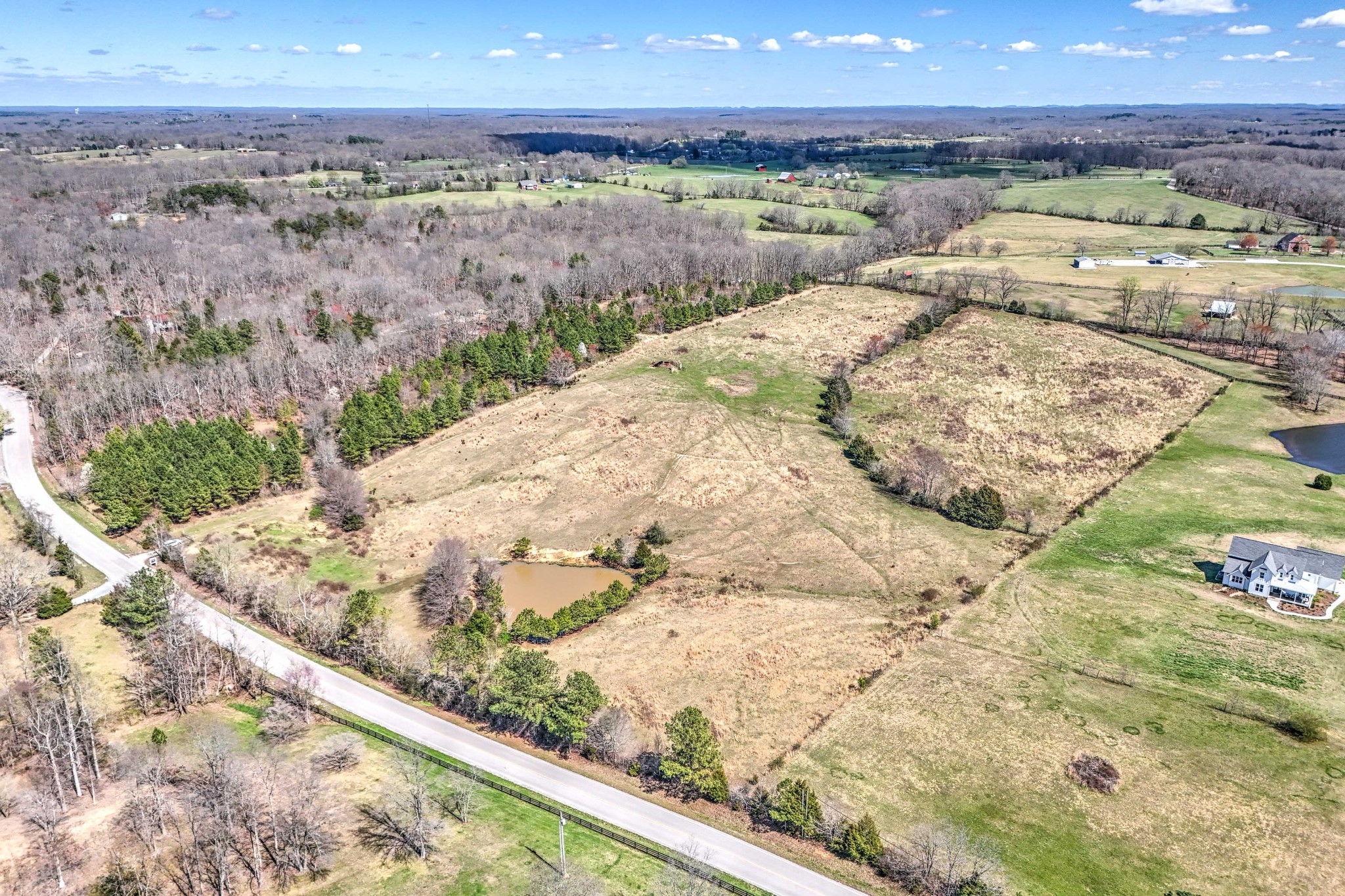 0 Bradford Road Primm Springs, TN 38476 - Photo 17 of 28 a view of a lake with a mountain