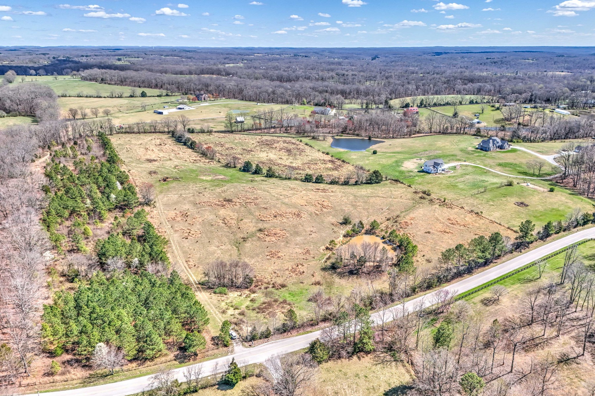 0 Bradford Road Primm Springs, TN 38476 - Photo 18 of 28 a view of a lake with beach
