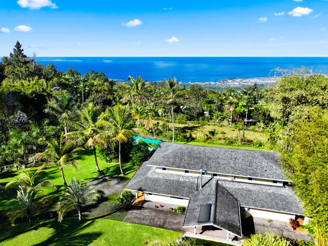 a view of yard with swimming pool