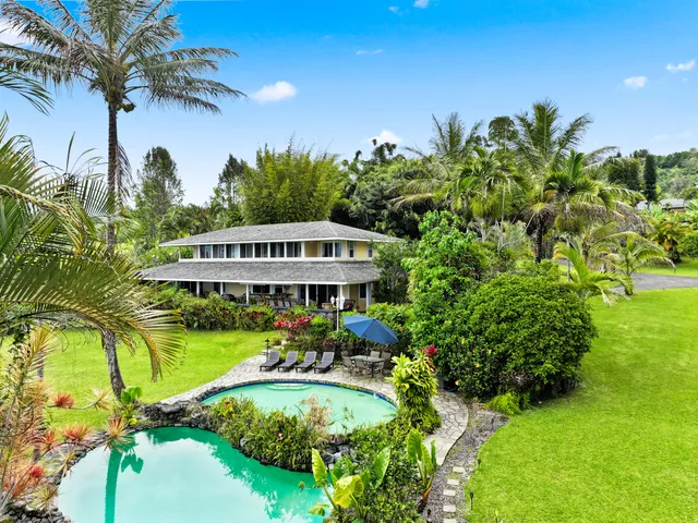 a view of a garden with a patio
