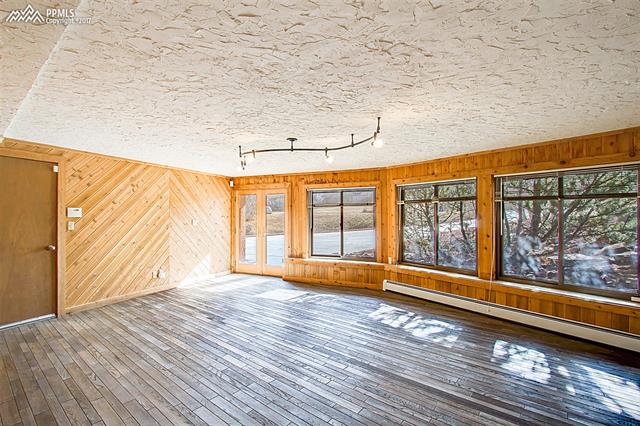 3780 Range View Road Monument, CO 80132 - Photo 23 of 33 Lower level room can be used as 4th bedroom. Walks out.