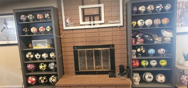 a room with multiple toys and a window