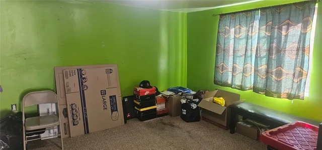 a room with furniture and a window