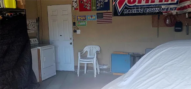 a view of a street with houses on the road