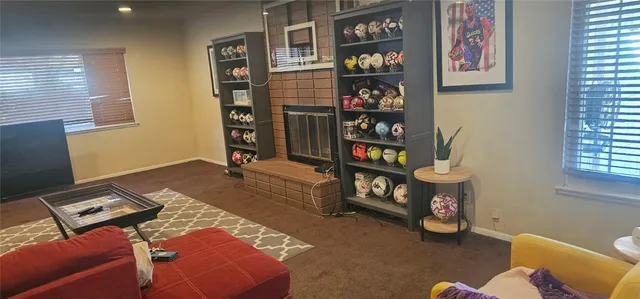 a bedroom with bed and a window