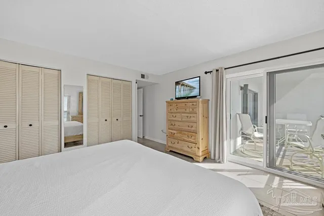 a bathroom with a toilet a sink and shower