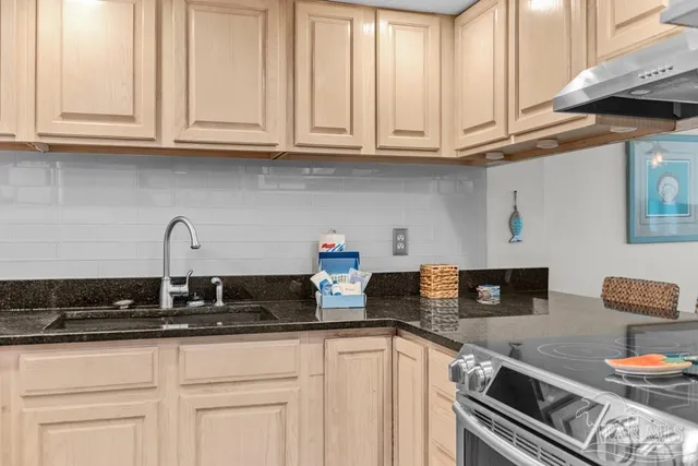 a bed sitting in a room next to a window