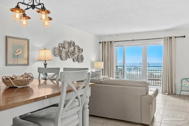 a view of a swimming pool and lounge chair