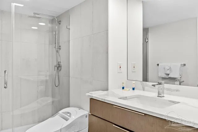 a view of a swimming pool with a lounge chairs