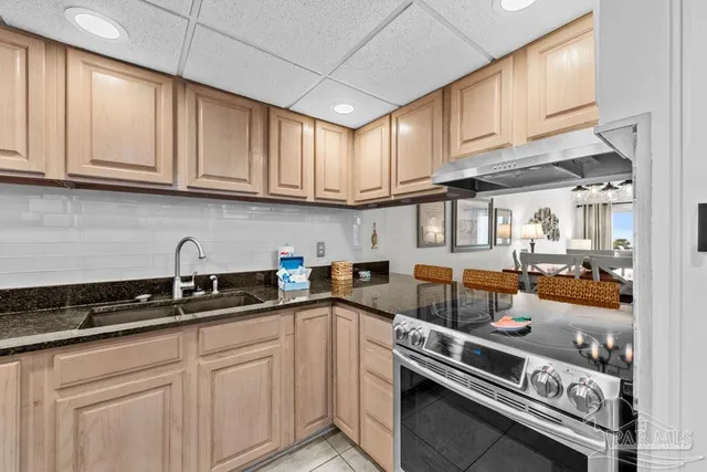 a view of a dining room with furniture and a livingroom