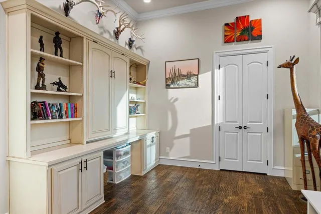 a view of kitchen with cabinets and wooden floor