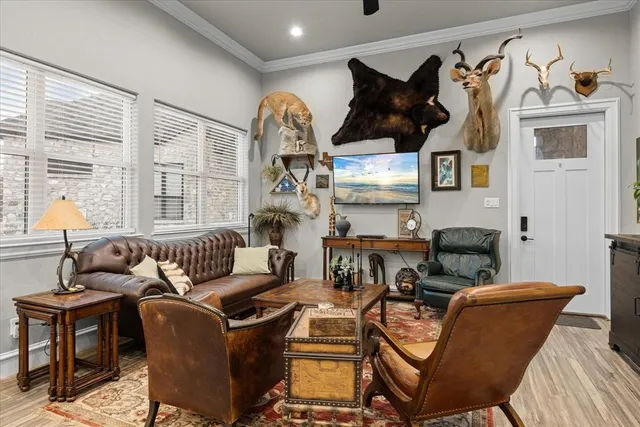 a living room with furniture and a window