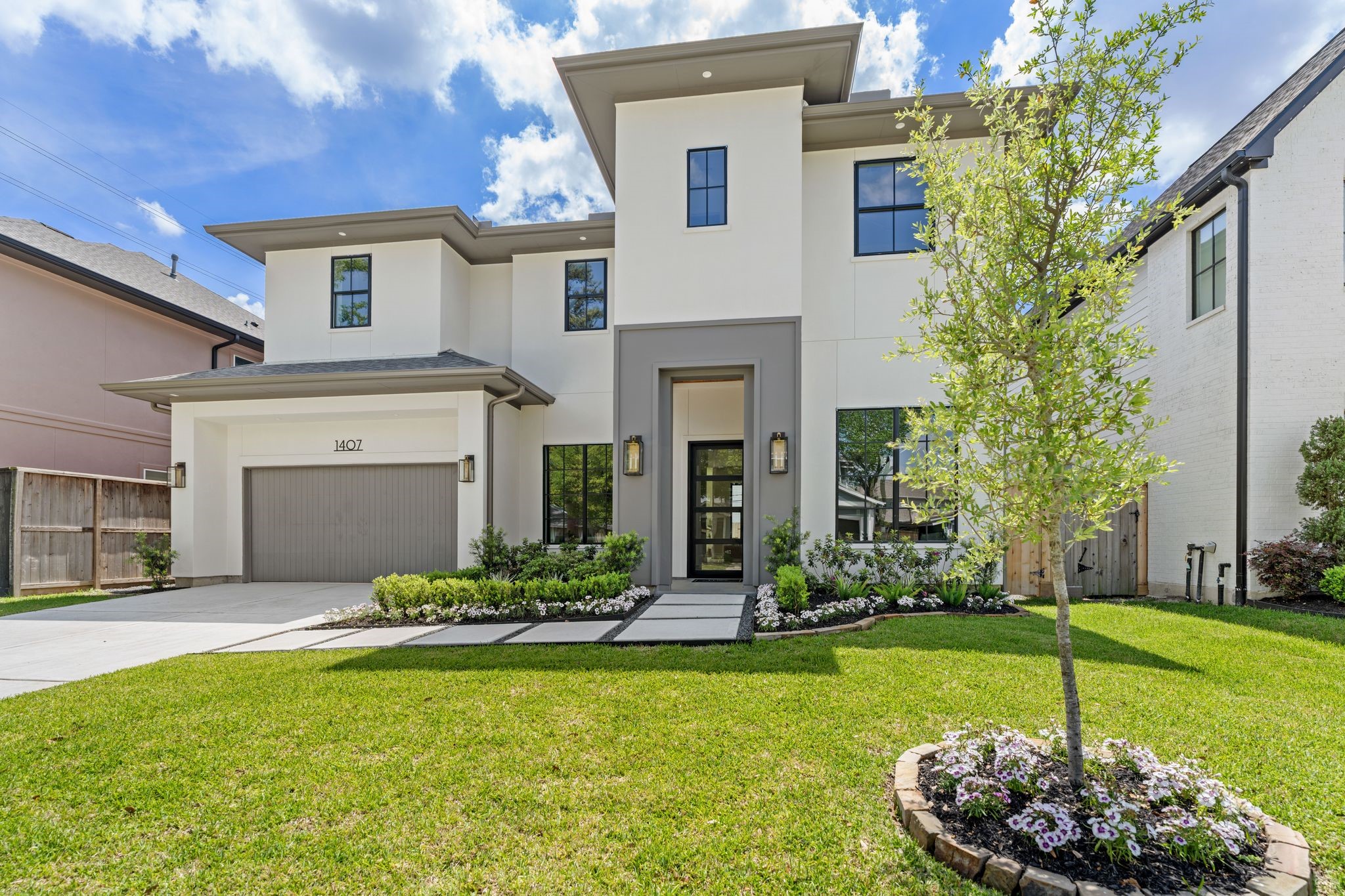 1407 Martin Street Houston, TX 77018 - Photo 2 of 44 A modern streamlined facade sets the tone for this impressive home.