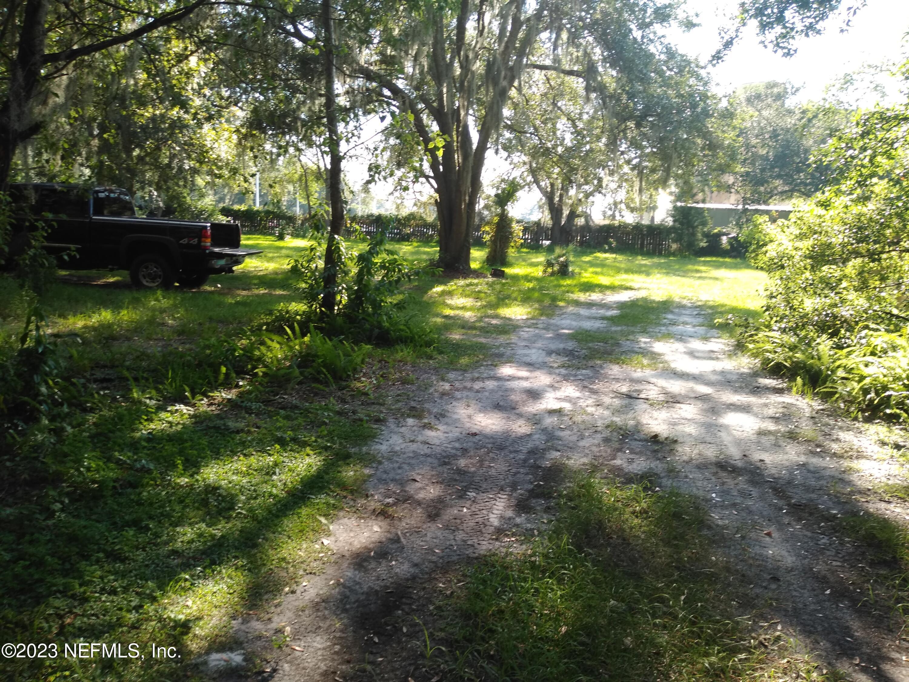 514 River Road Orange Park, FL 32073 - Photo 3 of 3 a view of a yard with a tree