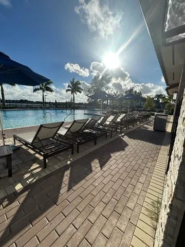a view of a terrace with sitting area