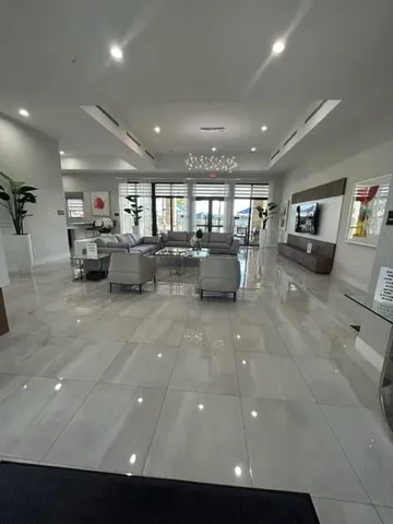 a view of a living room and dining room