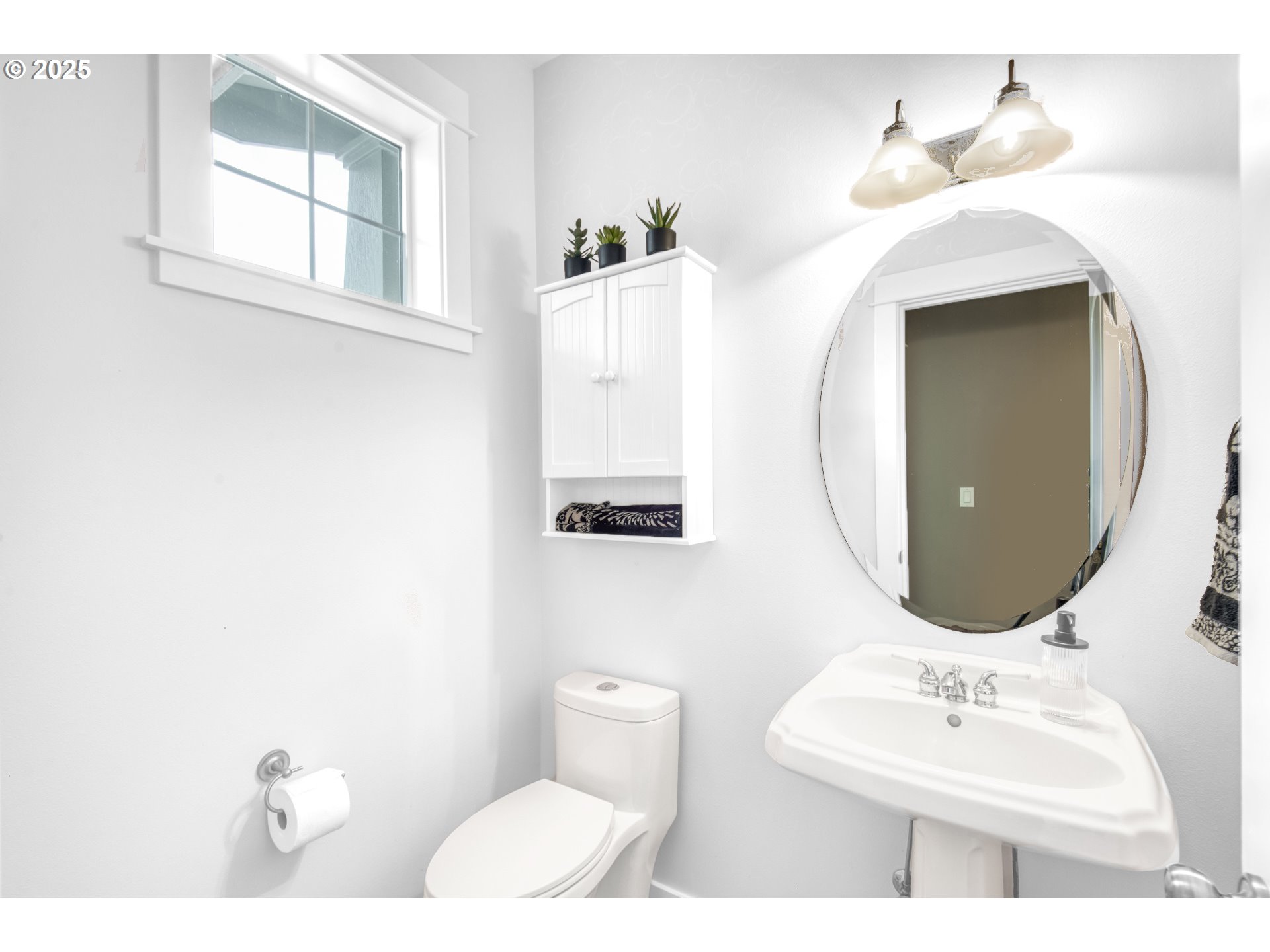 11540 Southwest 58th Court Portland, OR 97219 - Photo 15 of 33 a bathroom with a sink vanity mirror and toilet