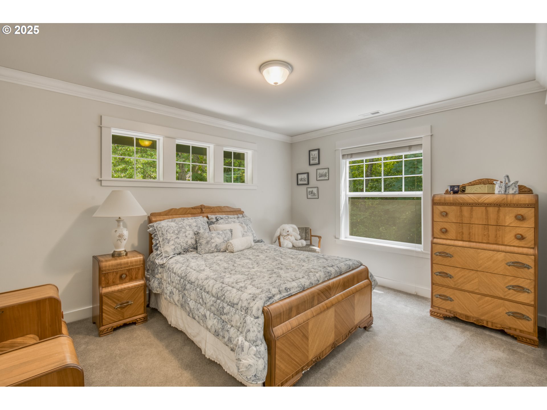11540 Southwest 58th Court Portland, OR 97219 - Photo 21 of 33 a bedroom with a bed and a dresser