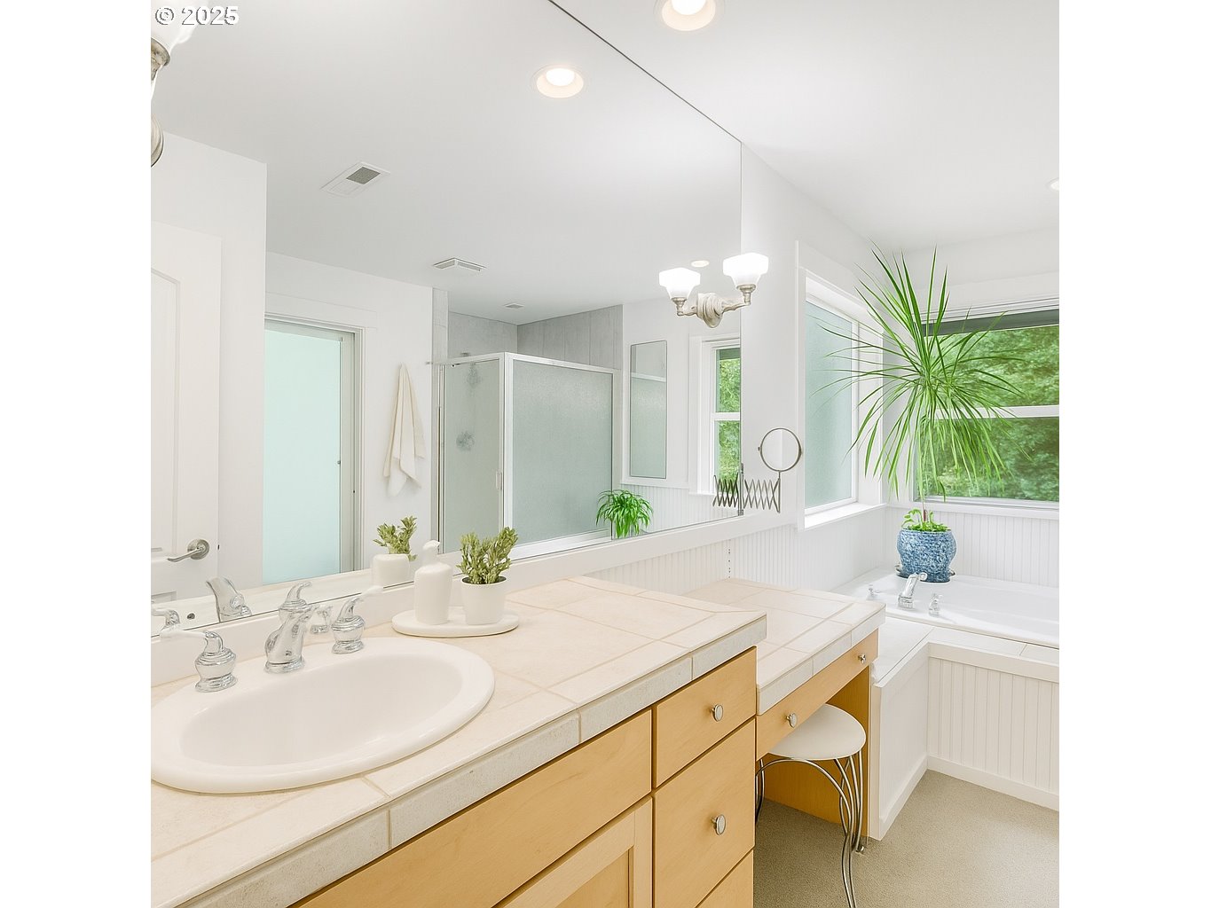 11540 Southwest 58th Court Portland, OR 97219 - Photo 25 of 33 a bathroom with a sink and a mirror