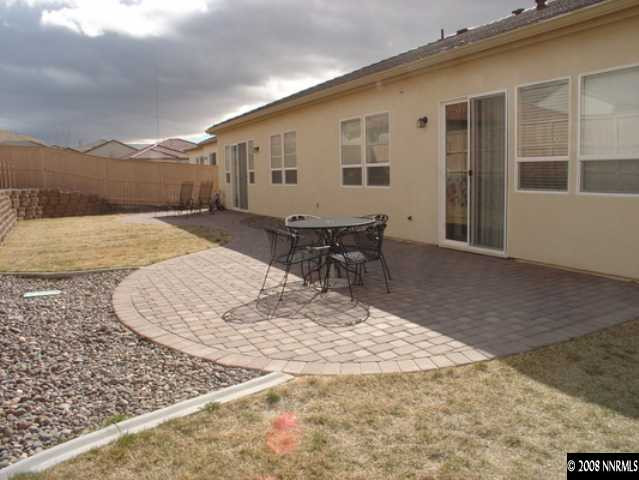 10694 Autumn Walk Lane Reno, NV 89521 - Photo 9 of 9 a view of a house with backyard